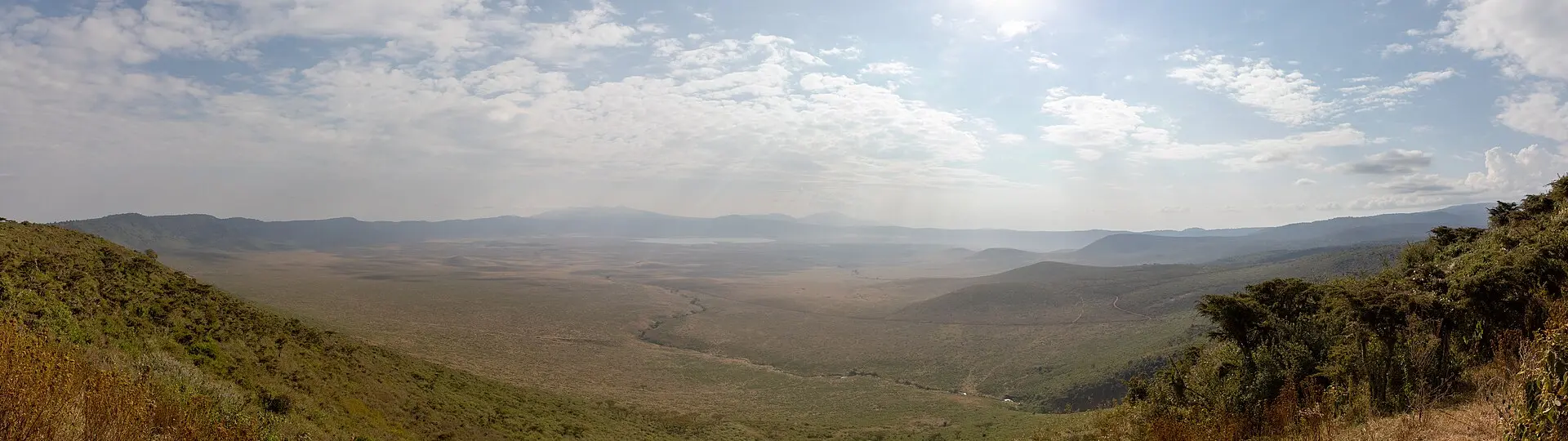 Wide panoramic view across the floor and rim of Ngorongoro Crater in Tanzania